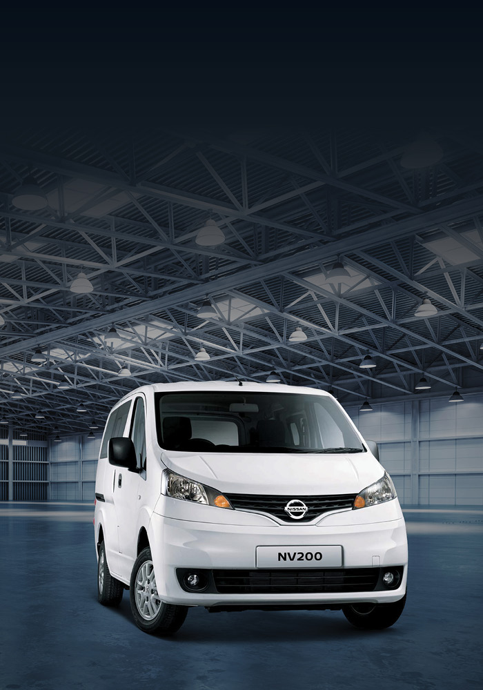 White NV200 in empty warehouse