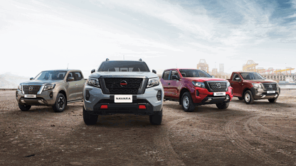 Group of Nissan Navara's in open field